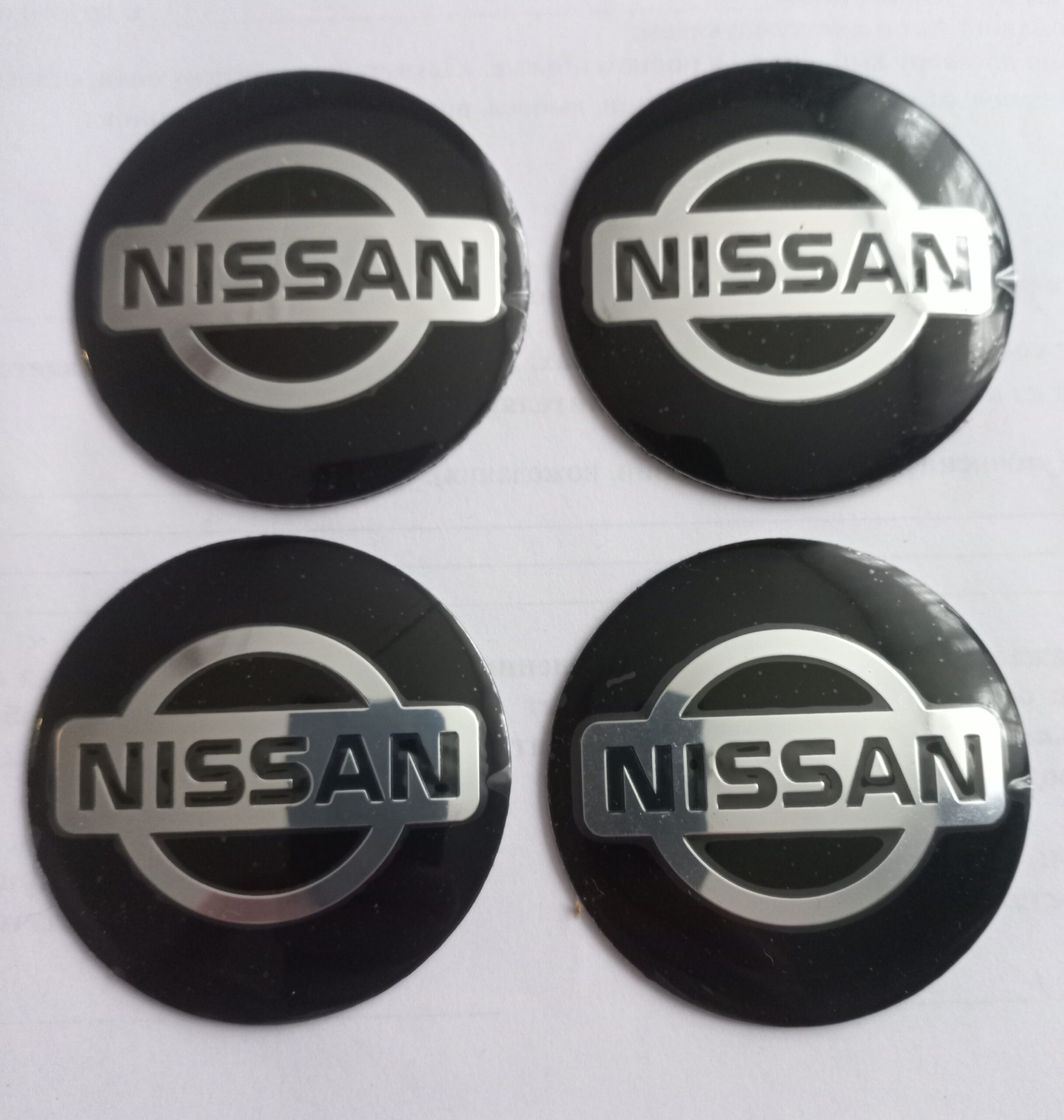 Наклейка на колпак Nissan к-т 4 шт  d=60